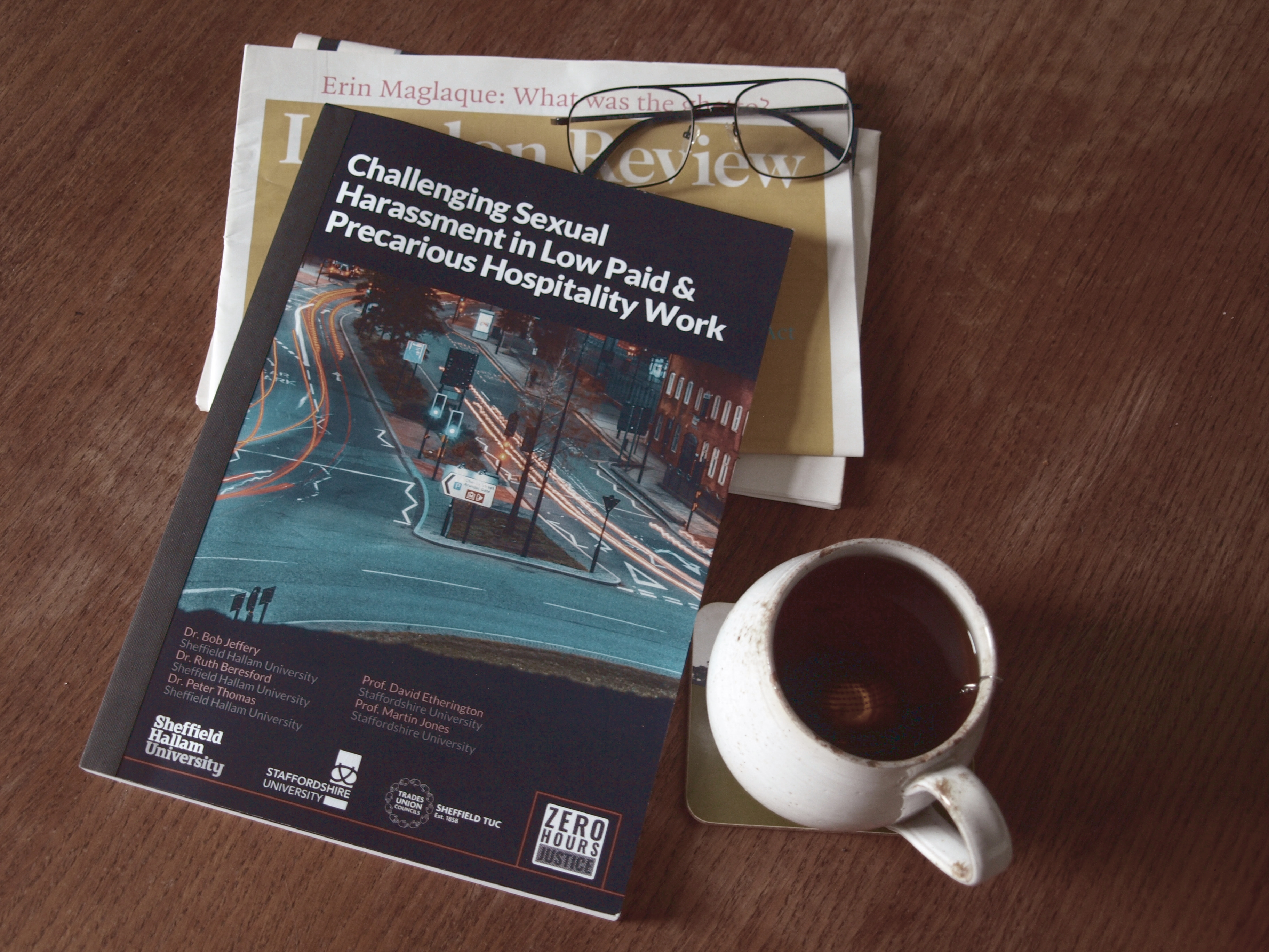one Cover of an academic report, made by Engine Head Studio